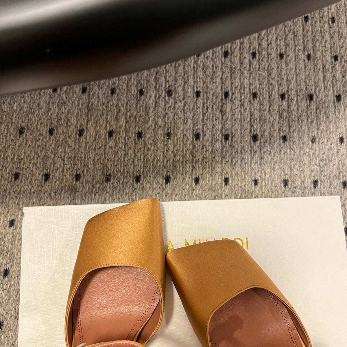 AMINA M HEELS