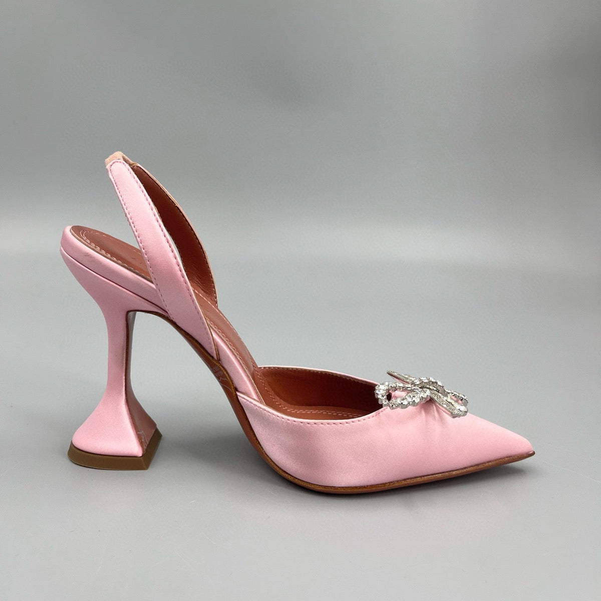 AMINA M HEELS