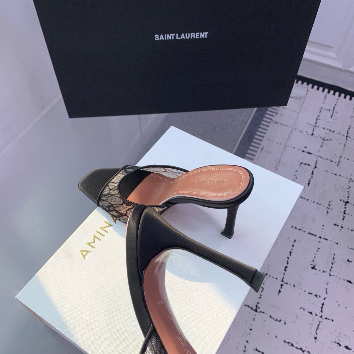 AMINA M HEELS