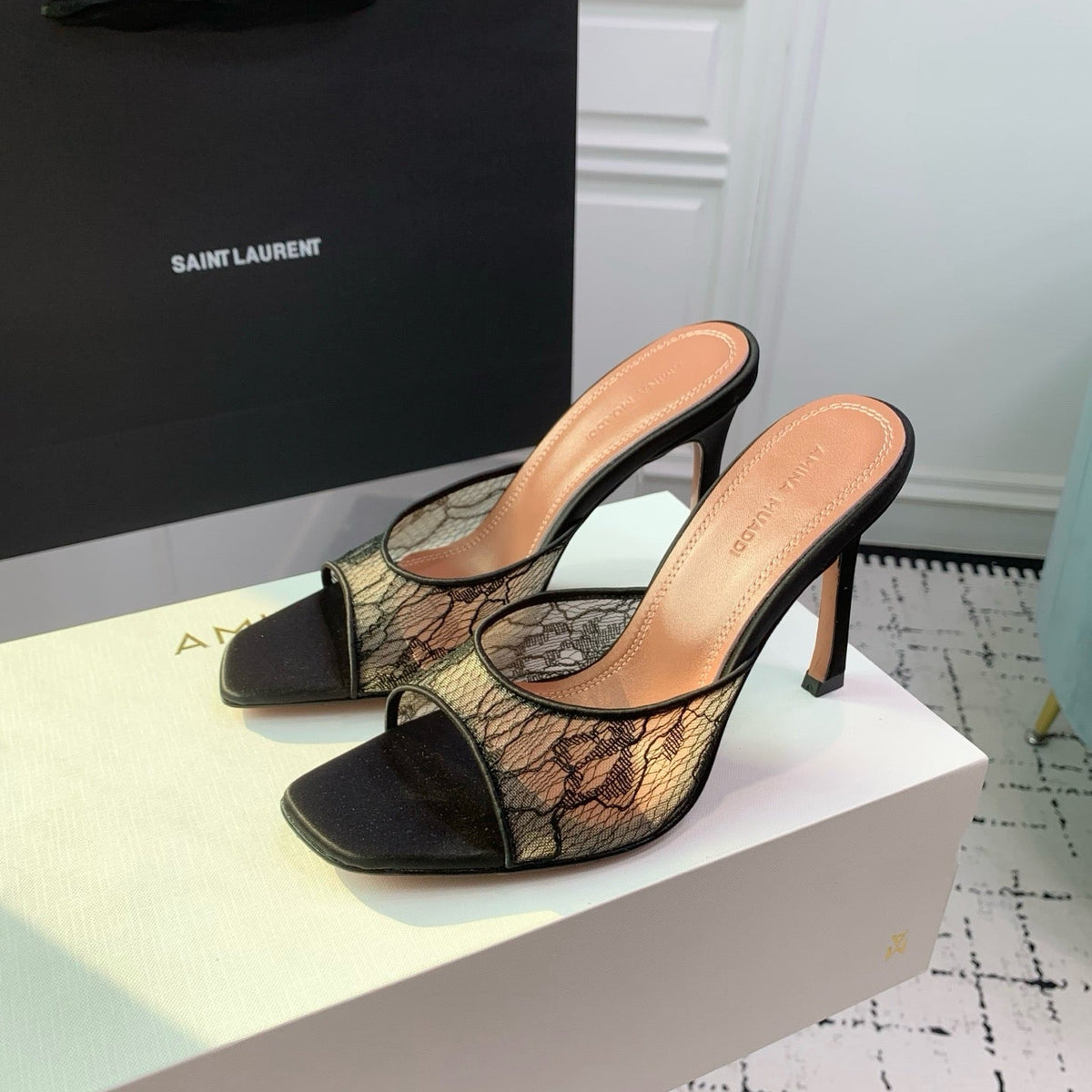 AMINA M HEELS