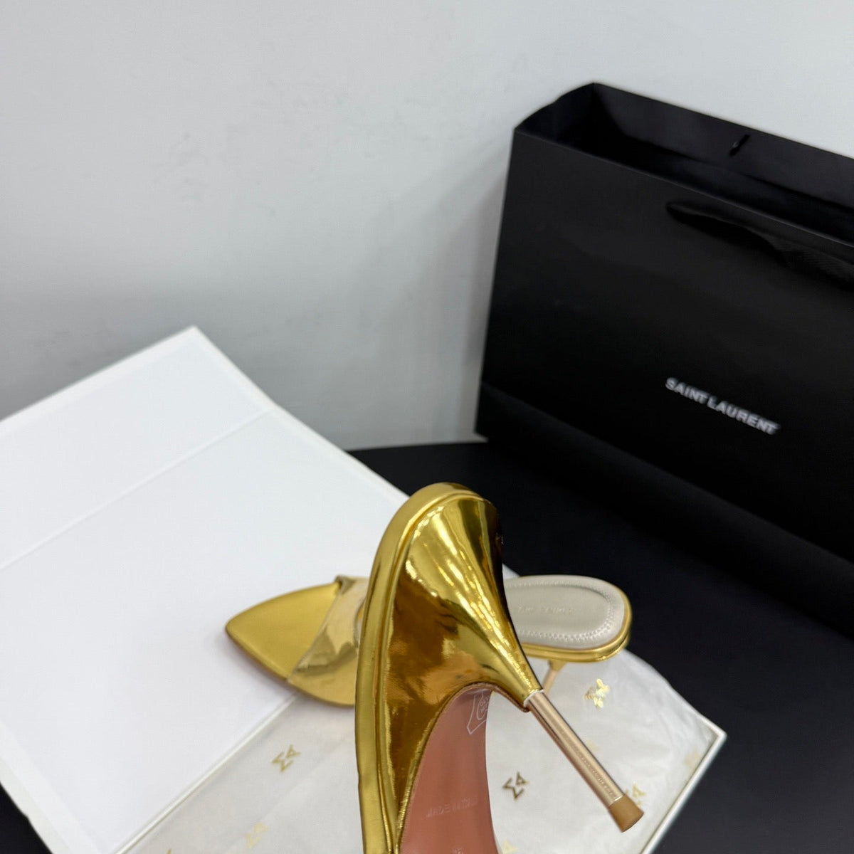 AMINA M HEELS