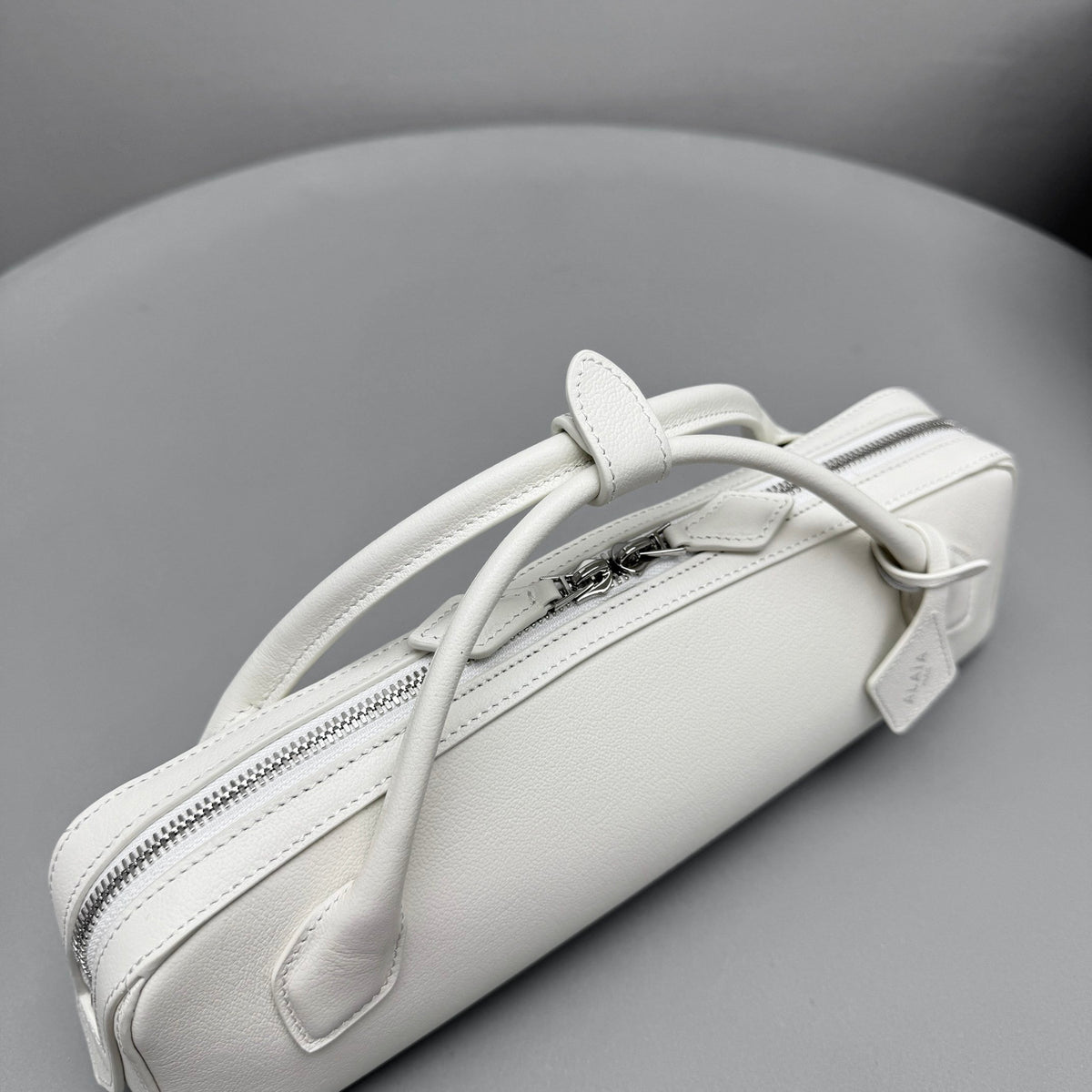 ALAIA LE TECKEL CLUTCH