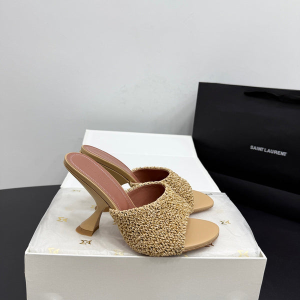 AMINA M HEELS