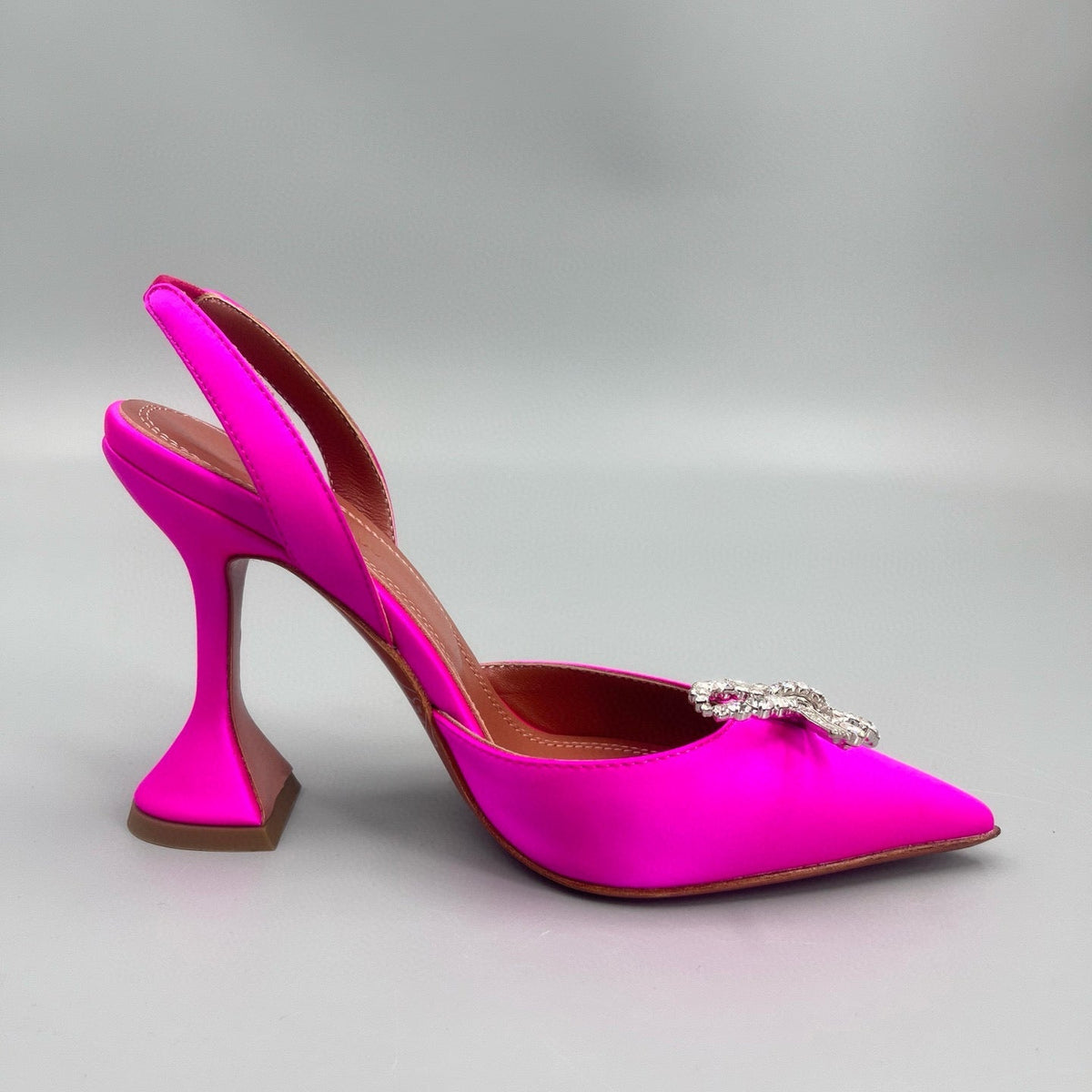 AMINA M HEELS