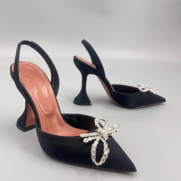 AMINA M HEELS