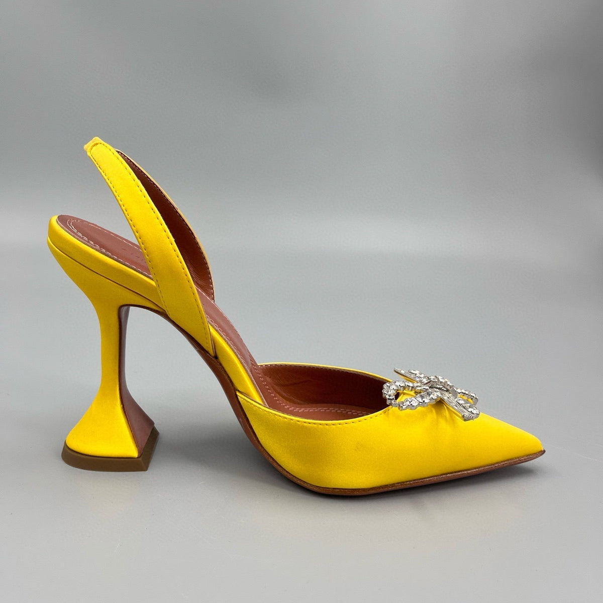 AMINA M HEELS