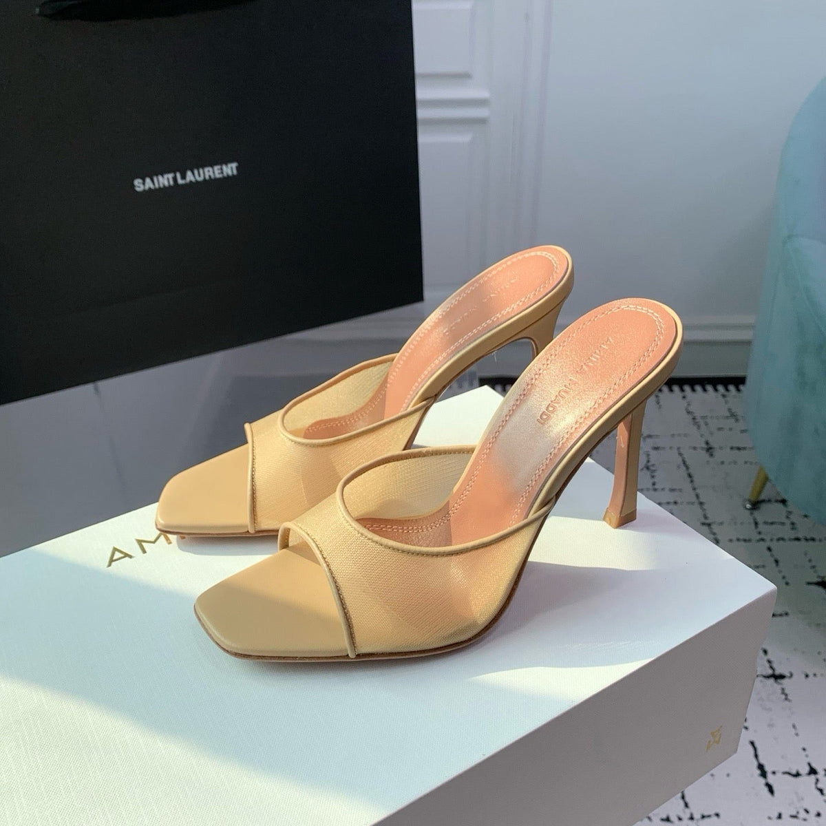 AMINA M HEELS