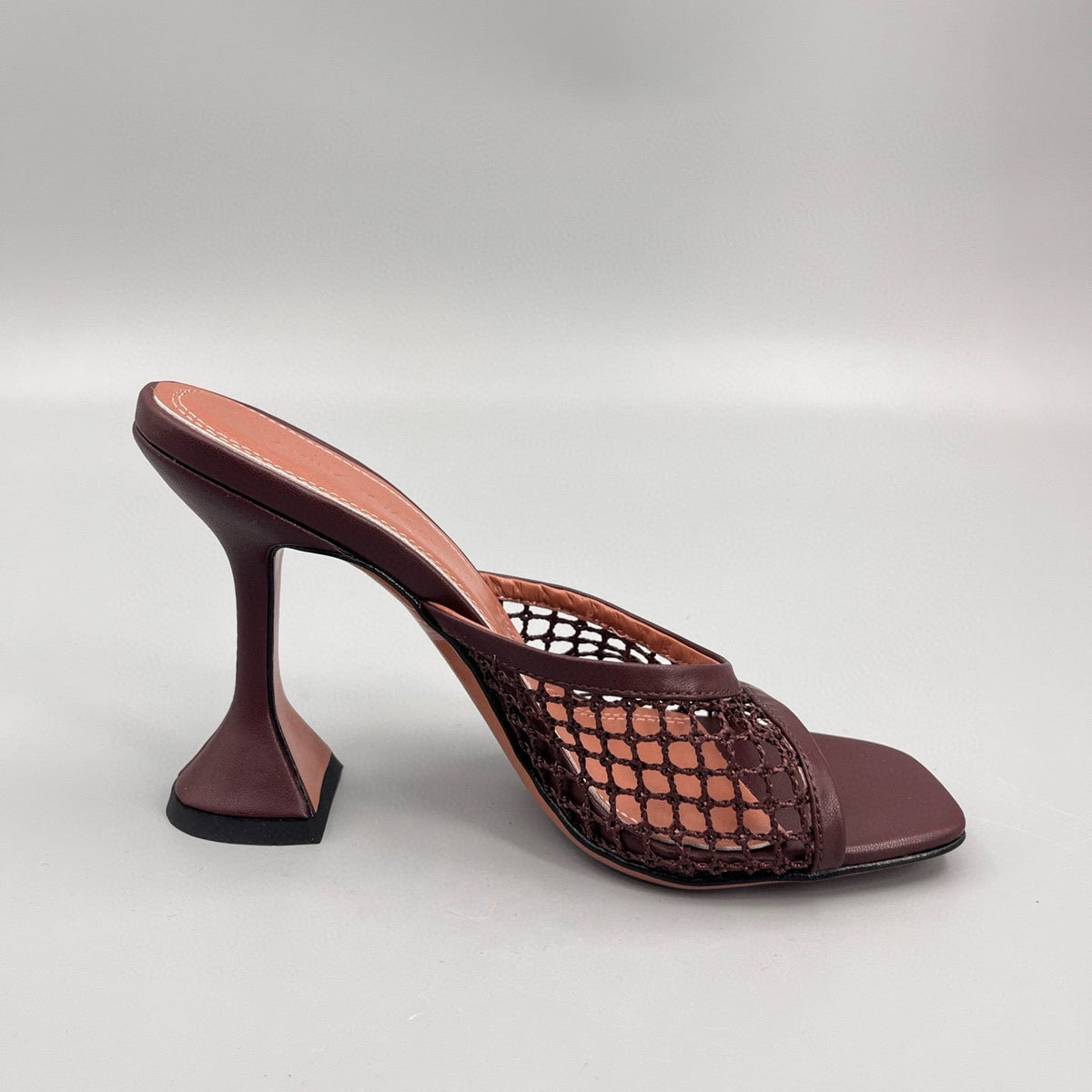 AMINA M HEELS