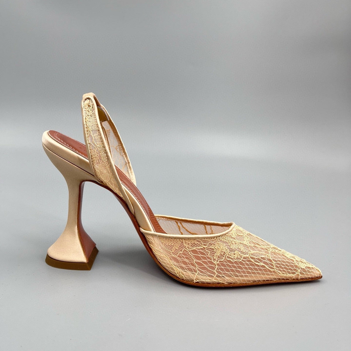 AMINA M HEELS