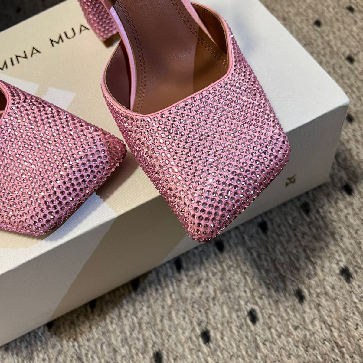 AMINA M HEELS