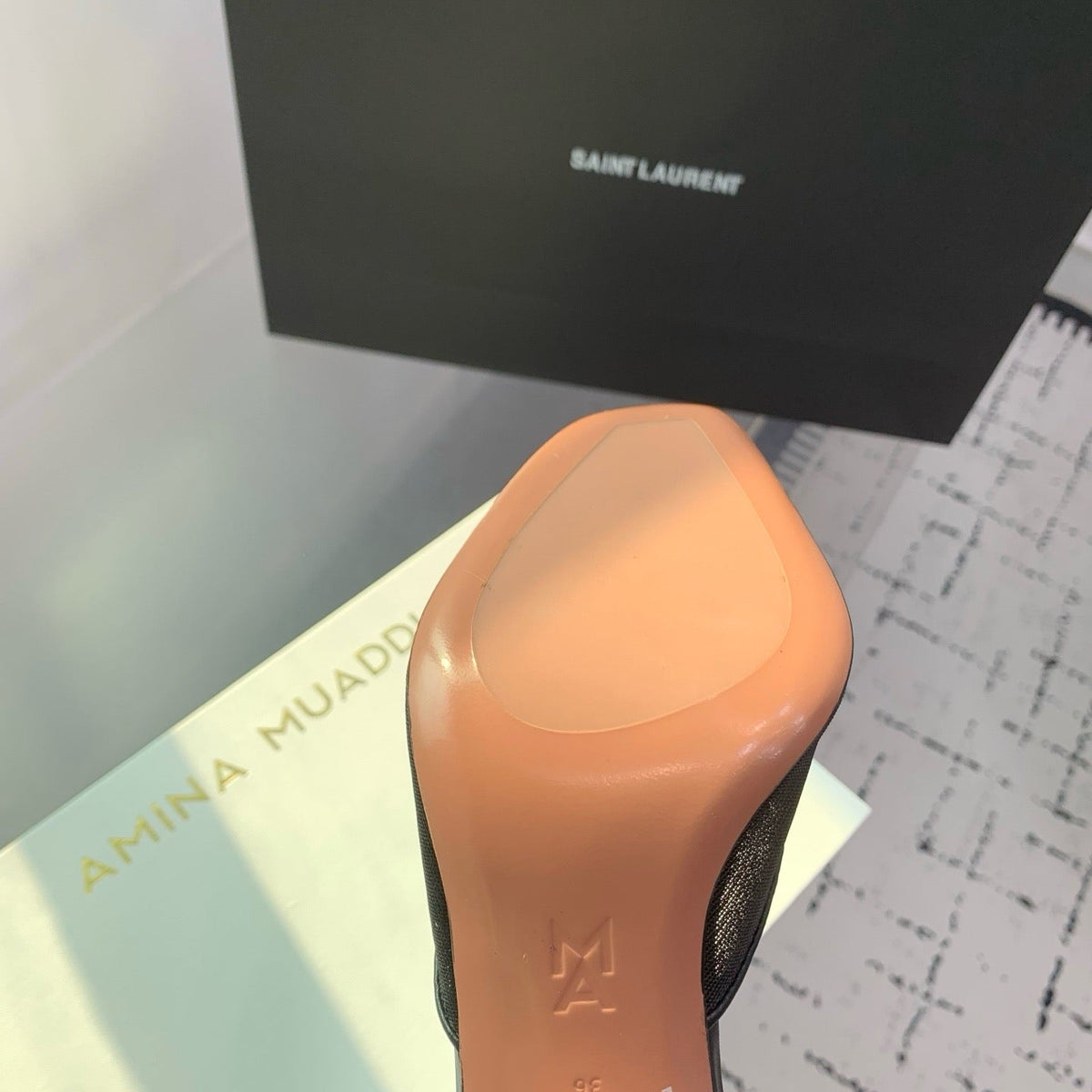 AMINA M HEELS