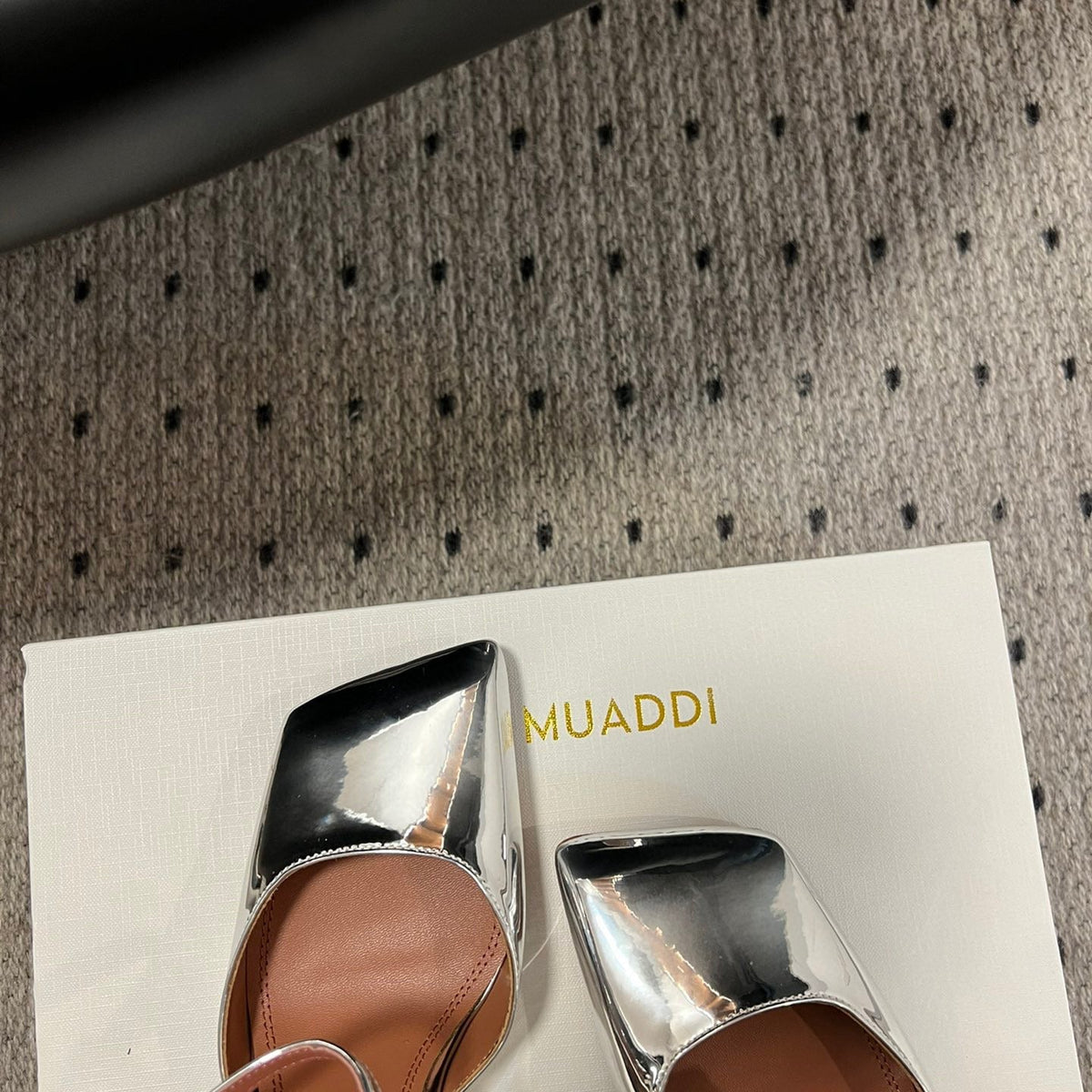 AMINA M HEELS