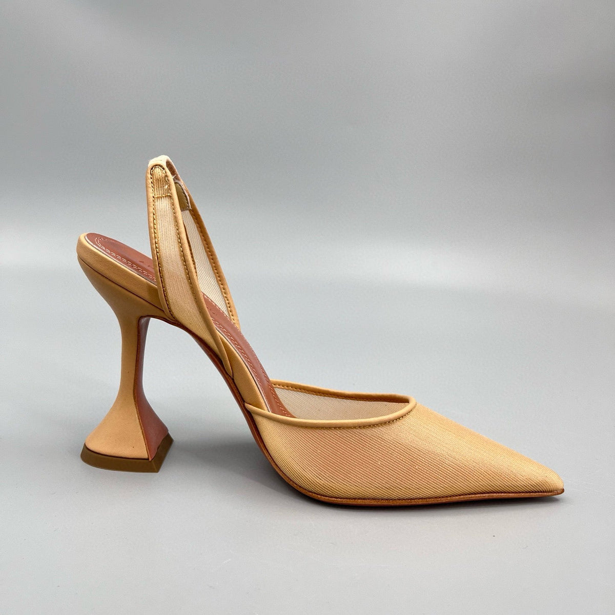 AMINA M HEELS
