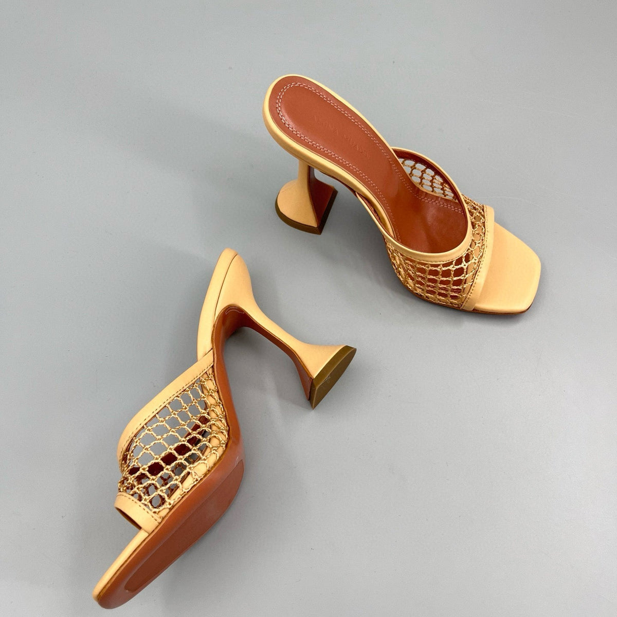 AMINA M HEELS