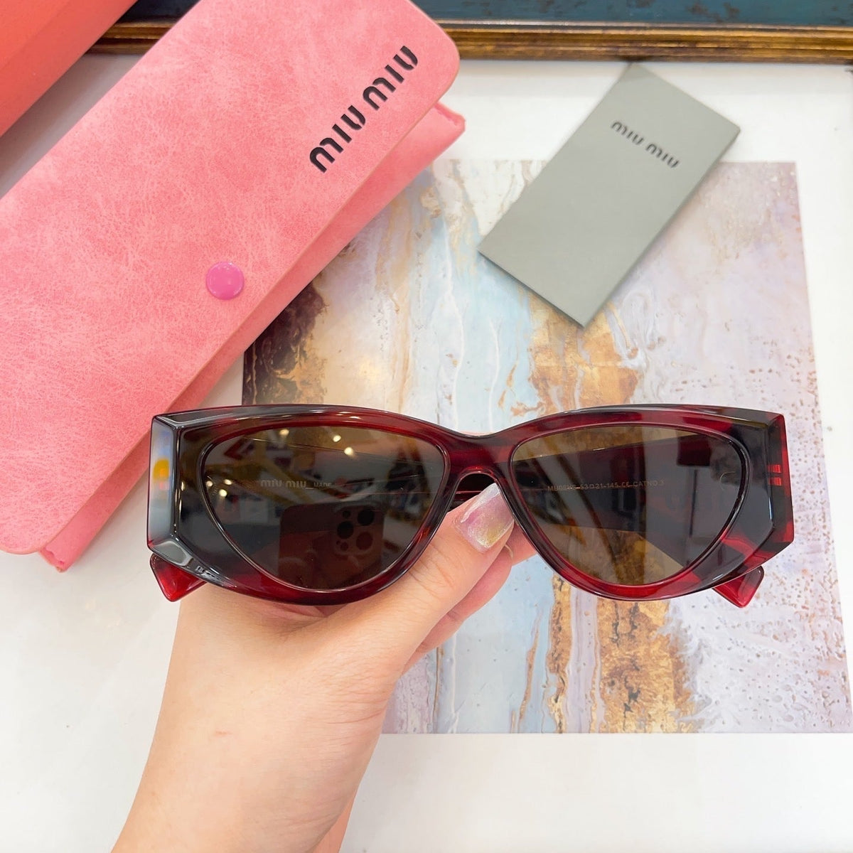 MIU M SUNGLASSES