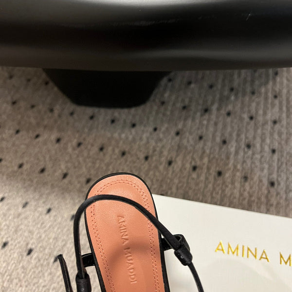AMINA M HEELS