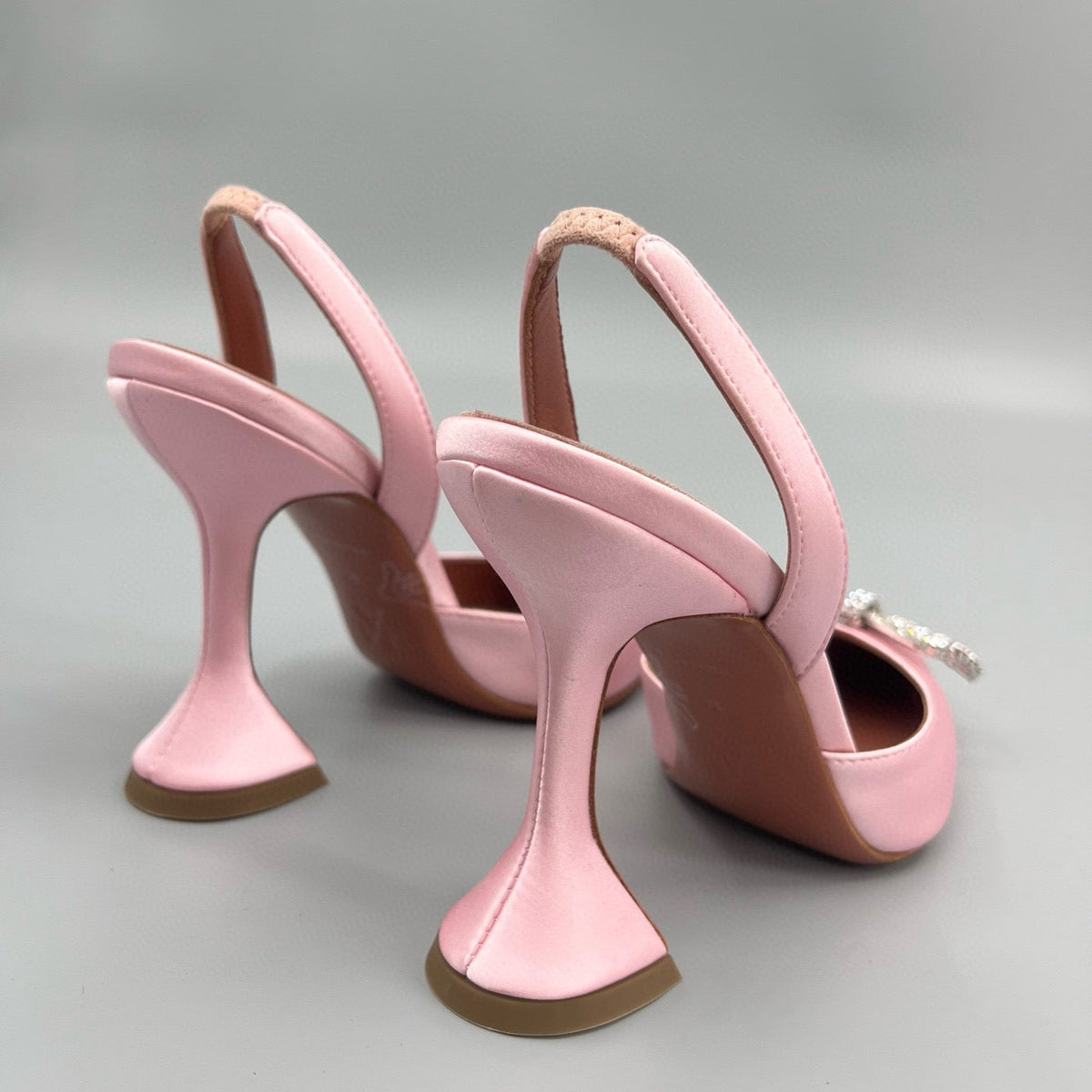 AMINA M HEELS