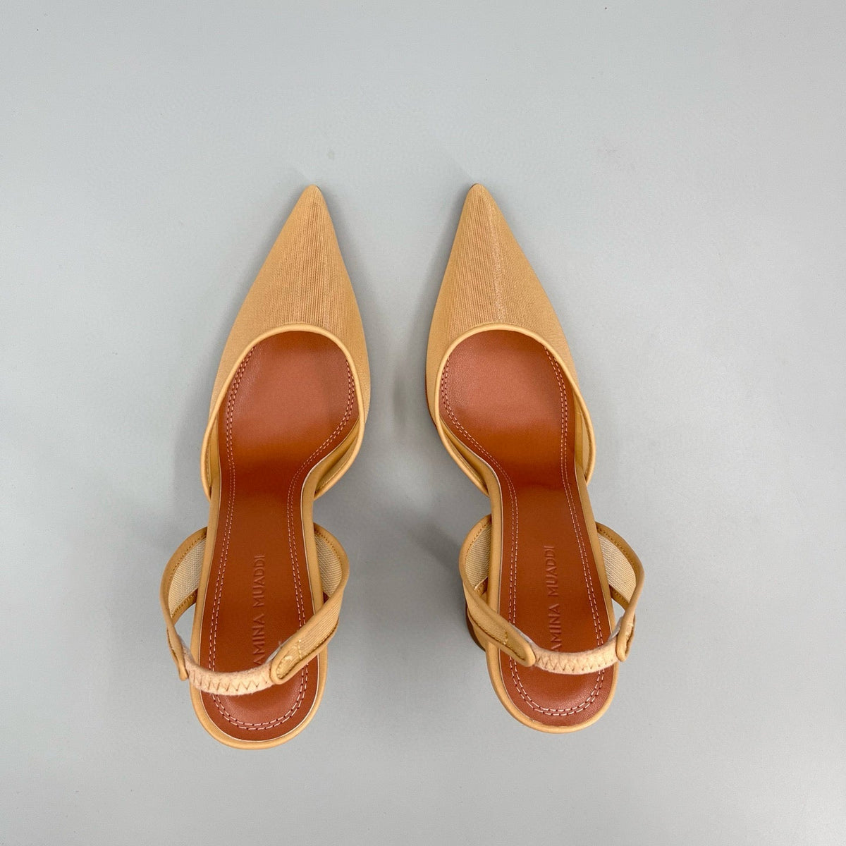 AMINA M HEELS