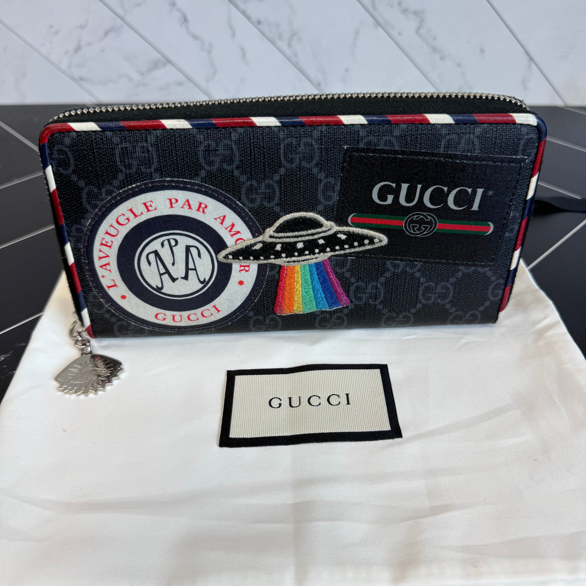 Gucci Canvas Courier Zippy Wallet