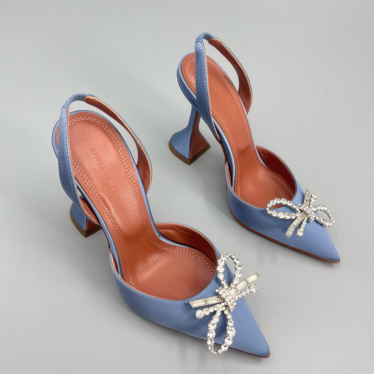AMINA M HEELS