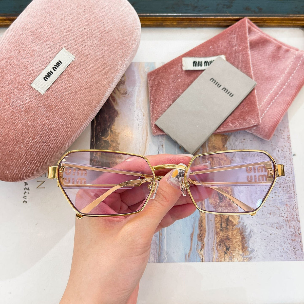 MIU M SUNGLASSES