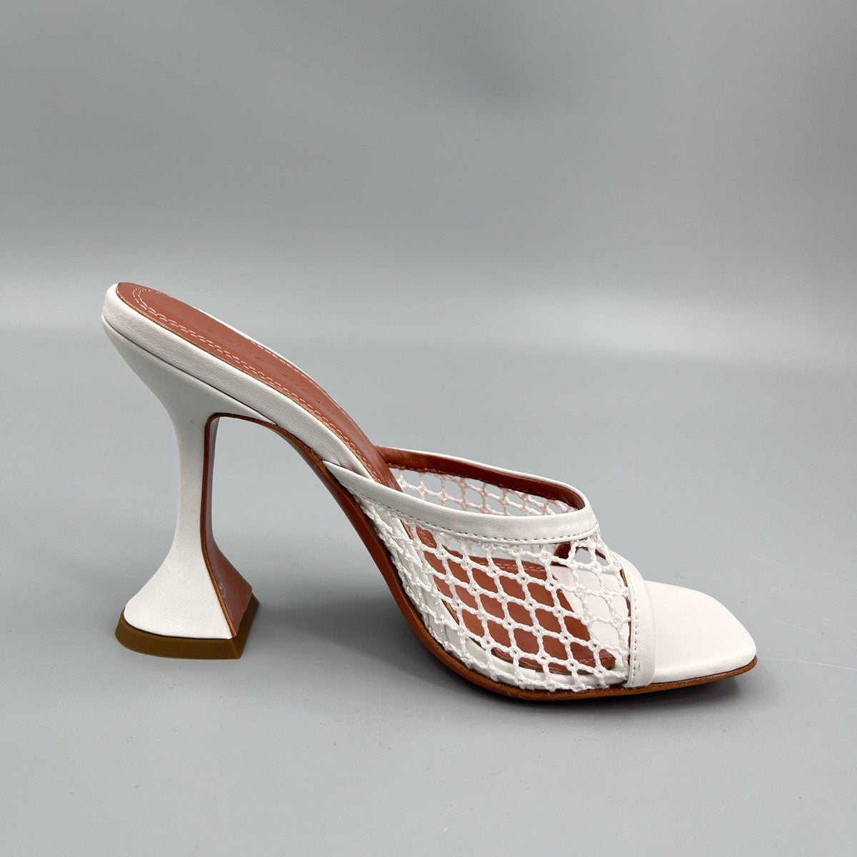 AMINA M HEELS