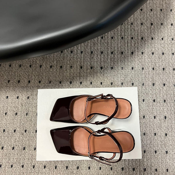 AMINA M HEELS