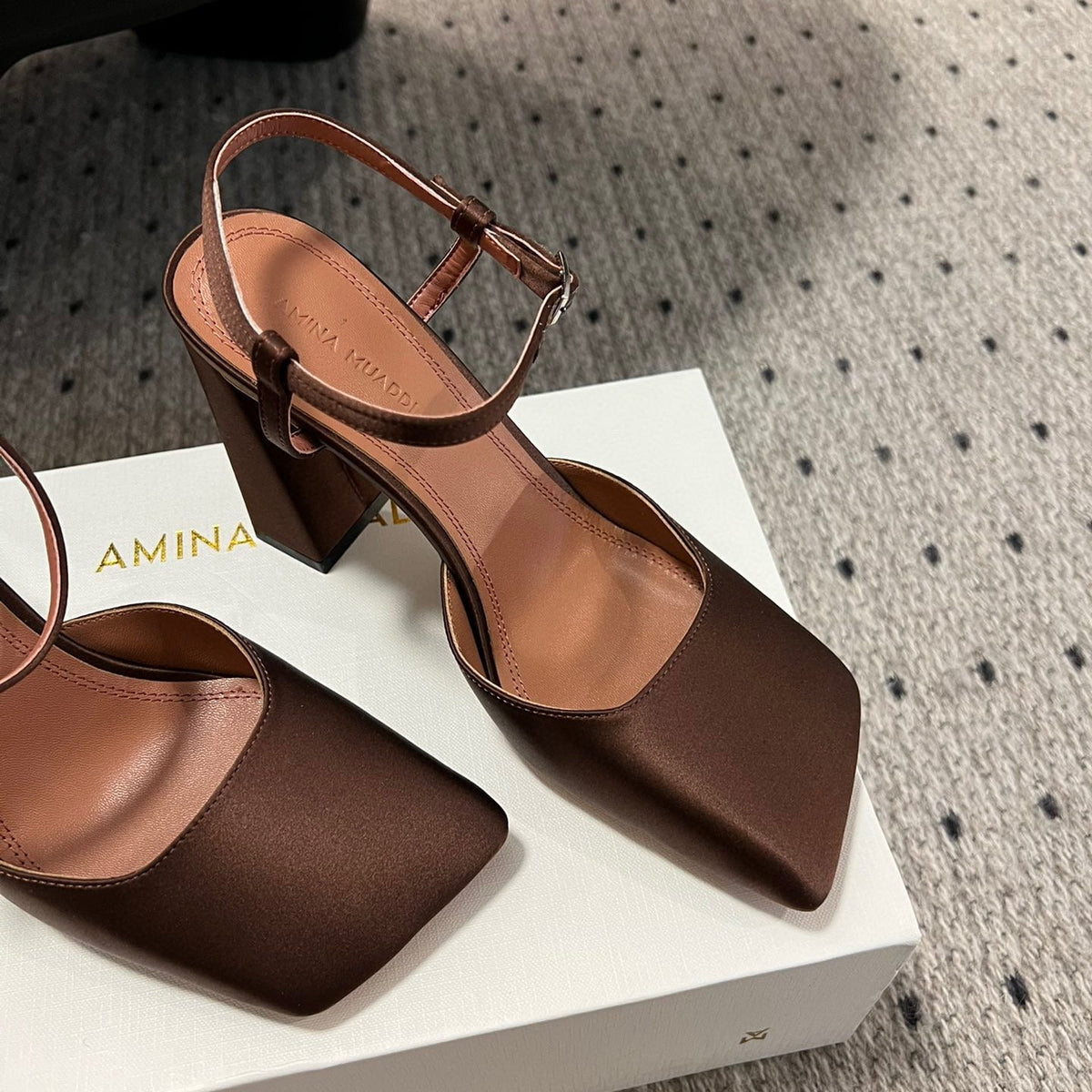 AMINA M HEELS