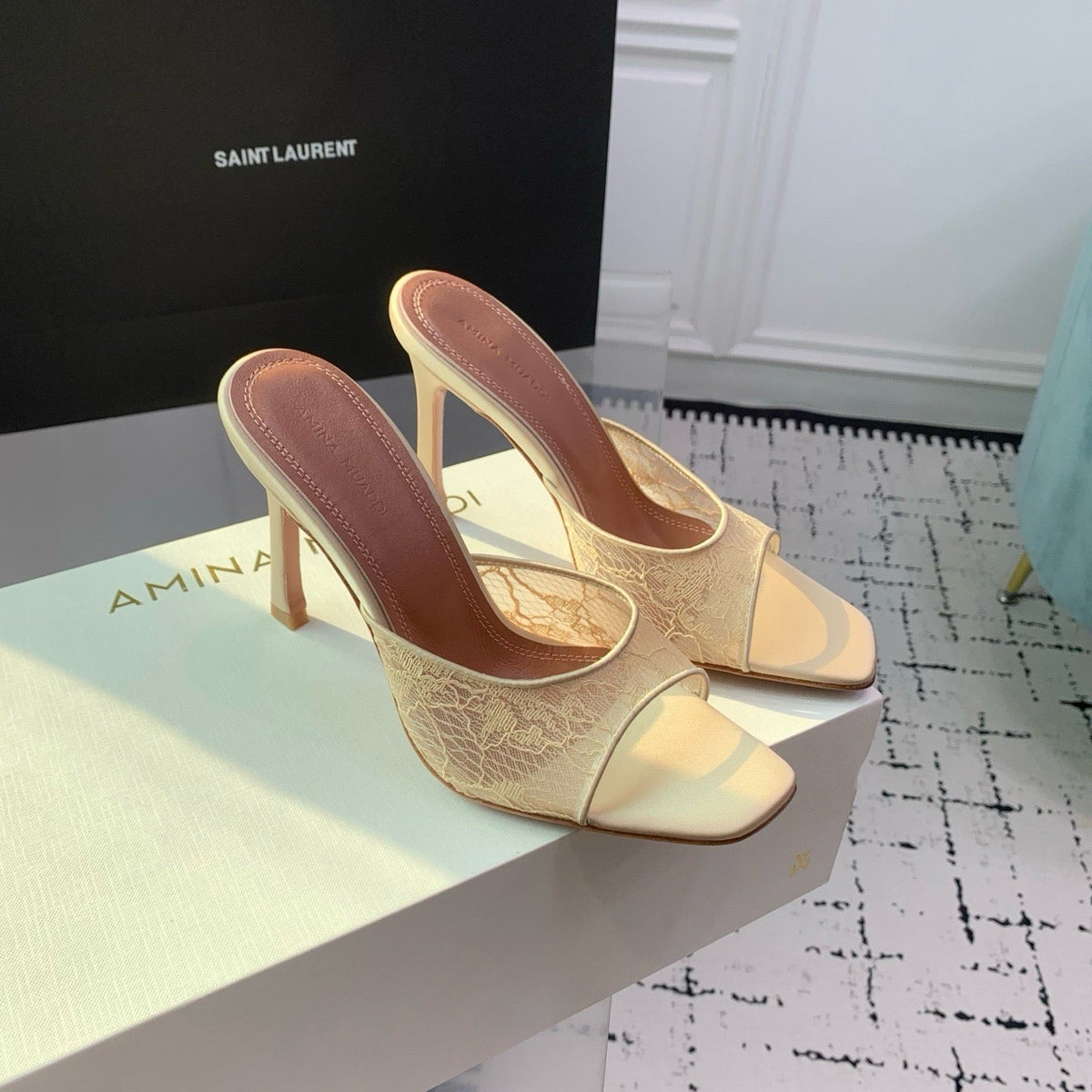 AMINA M HEELS