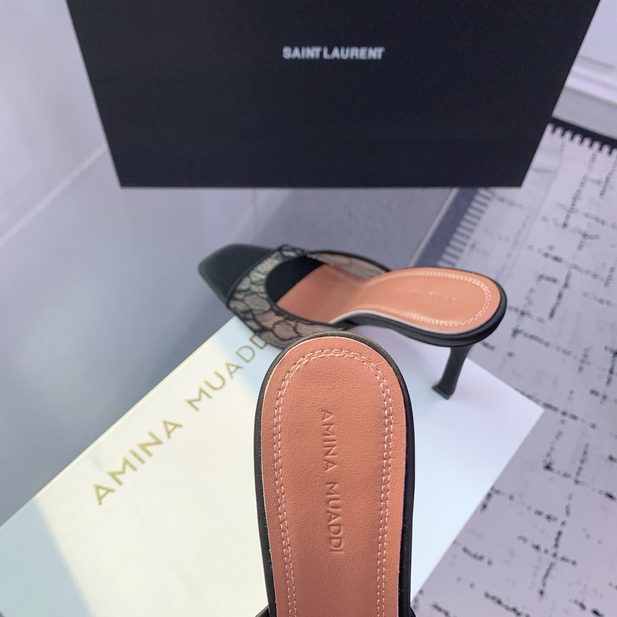 AMINA M HEELS
