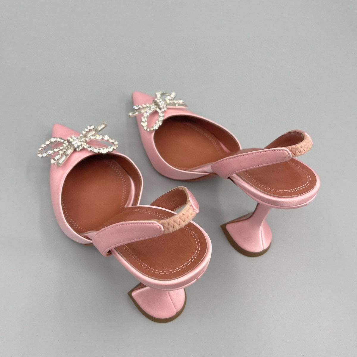 AMINA M HEELS