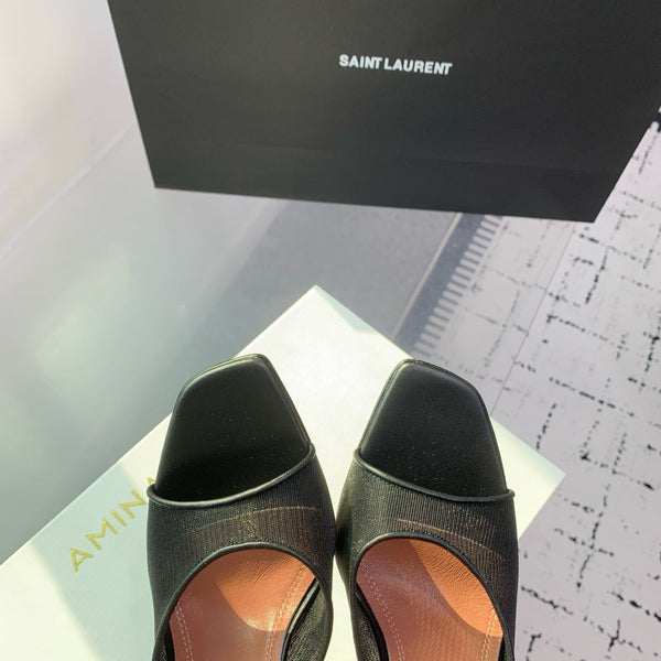 AMINA M HEELS