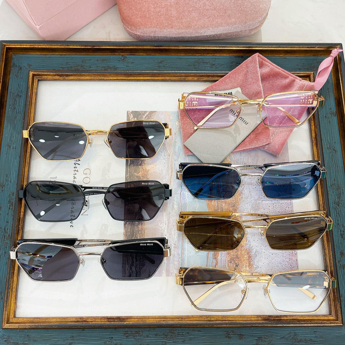 MIU M SUNGLASSES