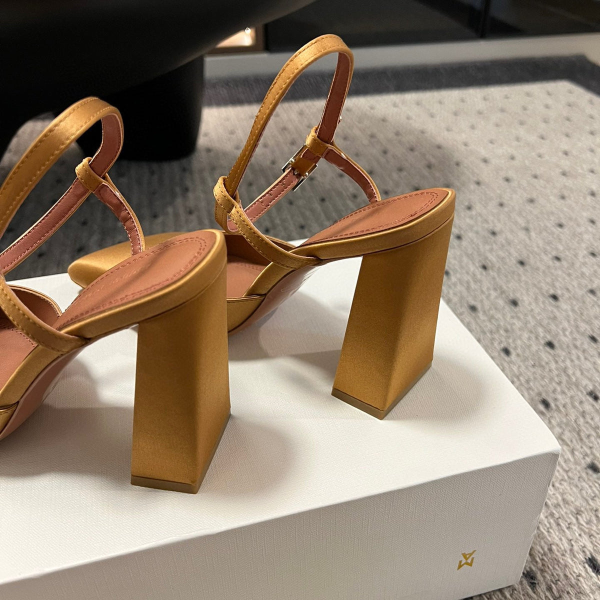 AMINA M HEELS