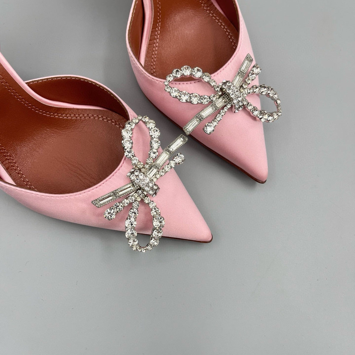 AMINA M HEELS