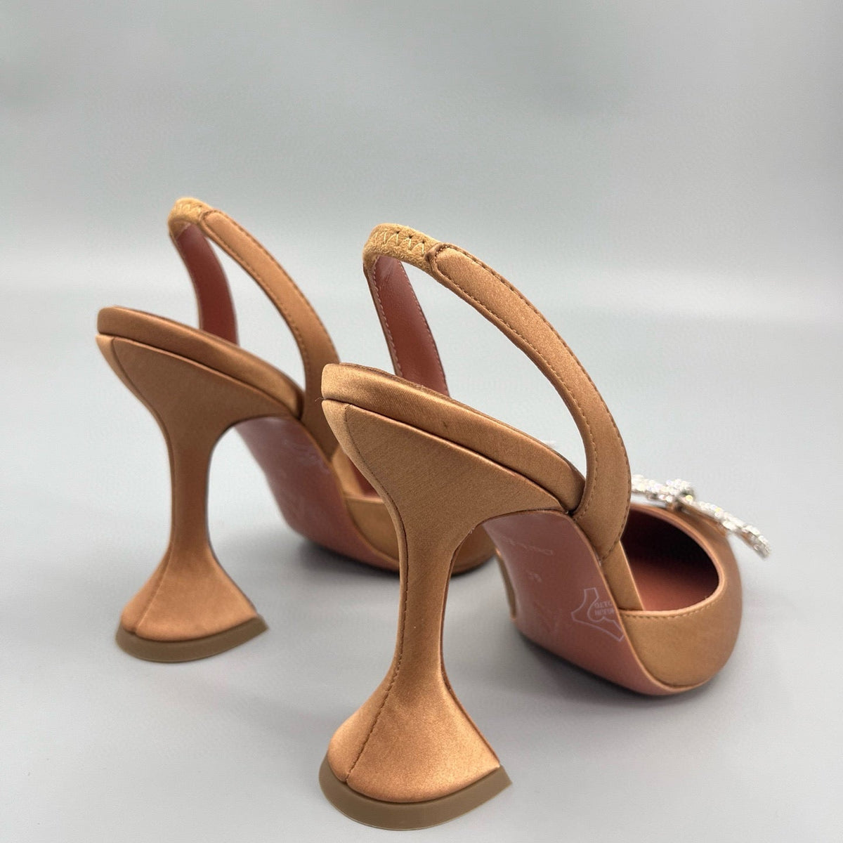 AMINA M HEELS