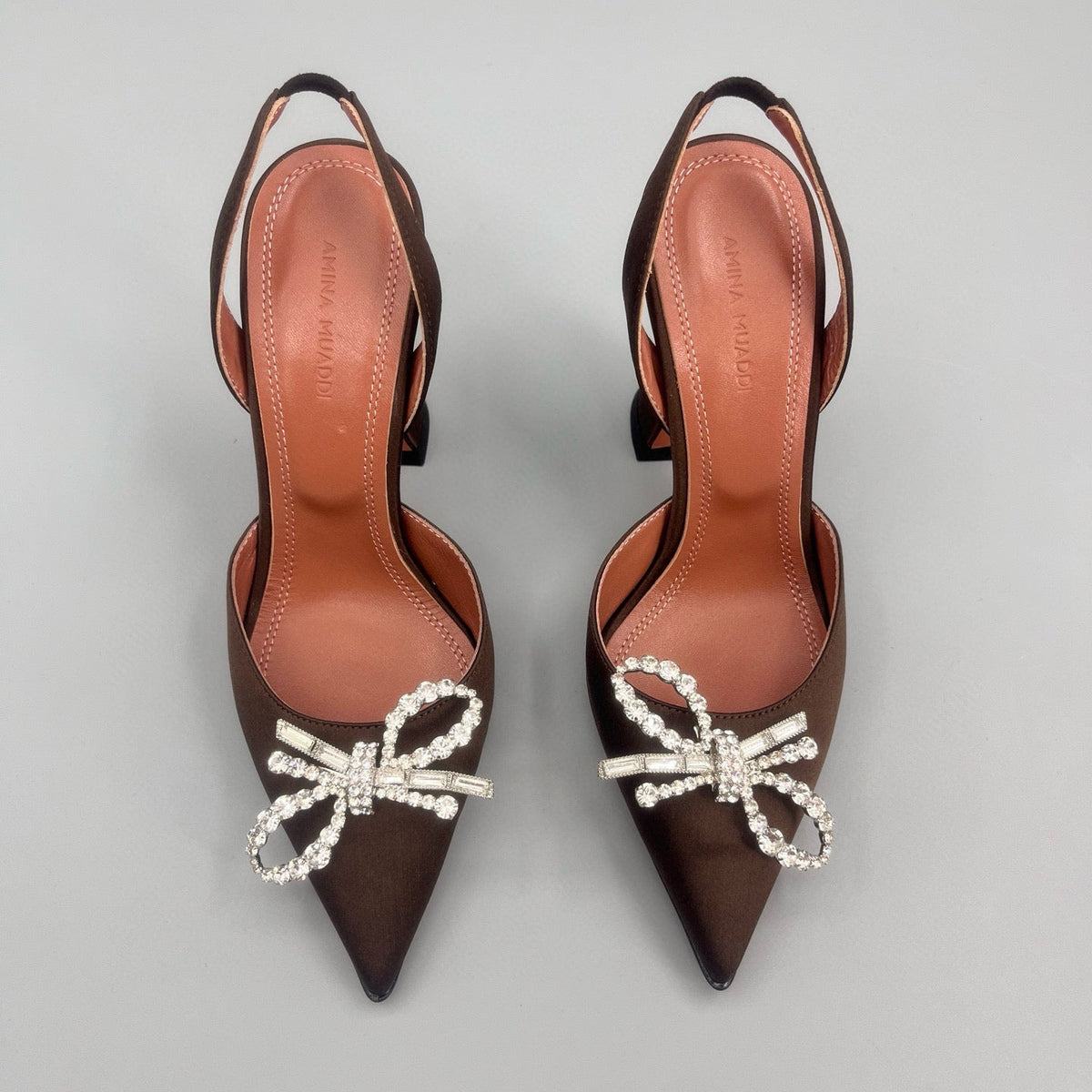 AMINA M HEELS