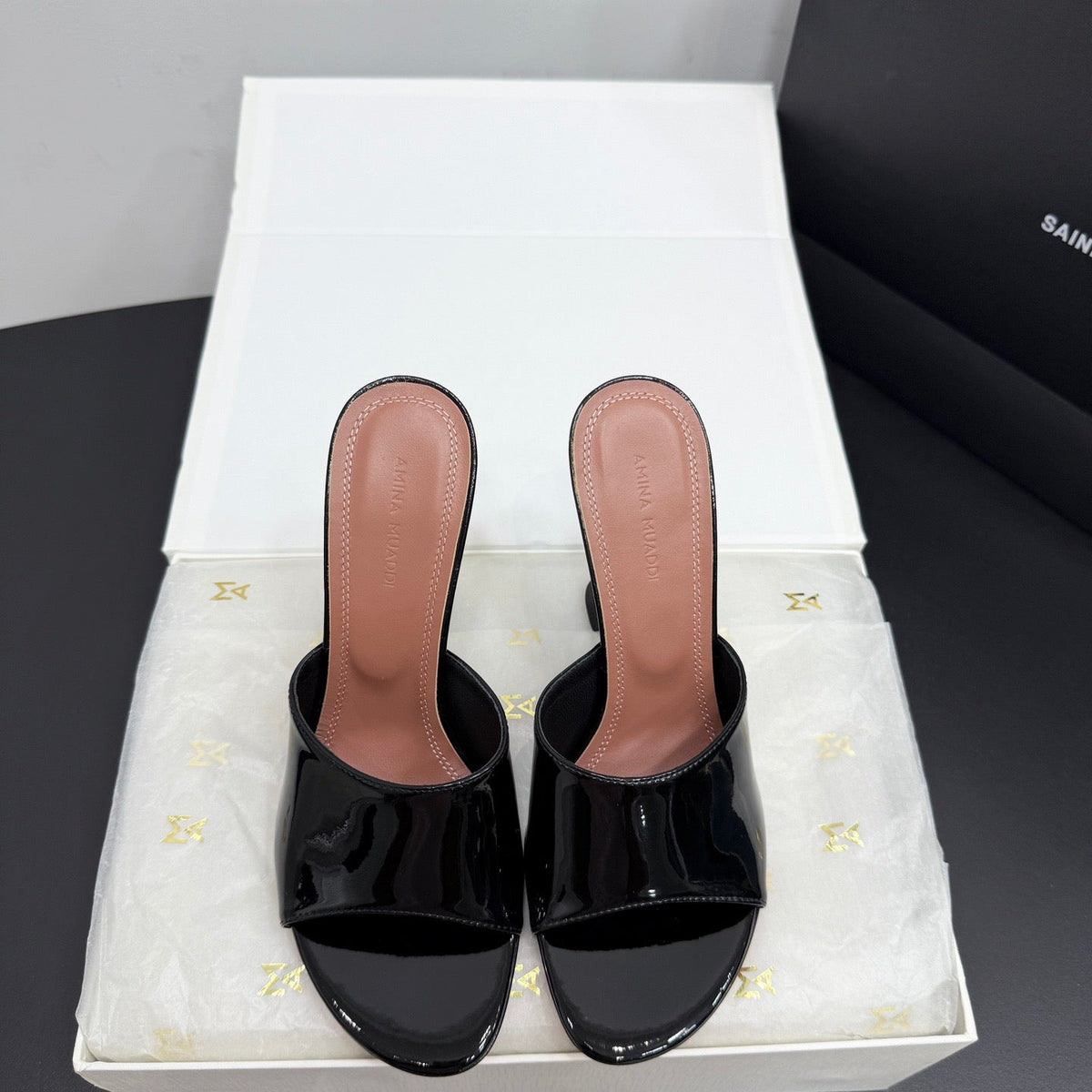 AMINA M HEELS