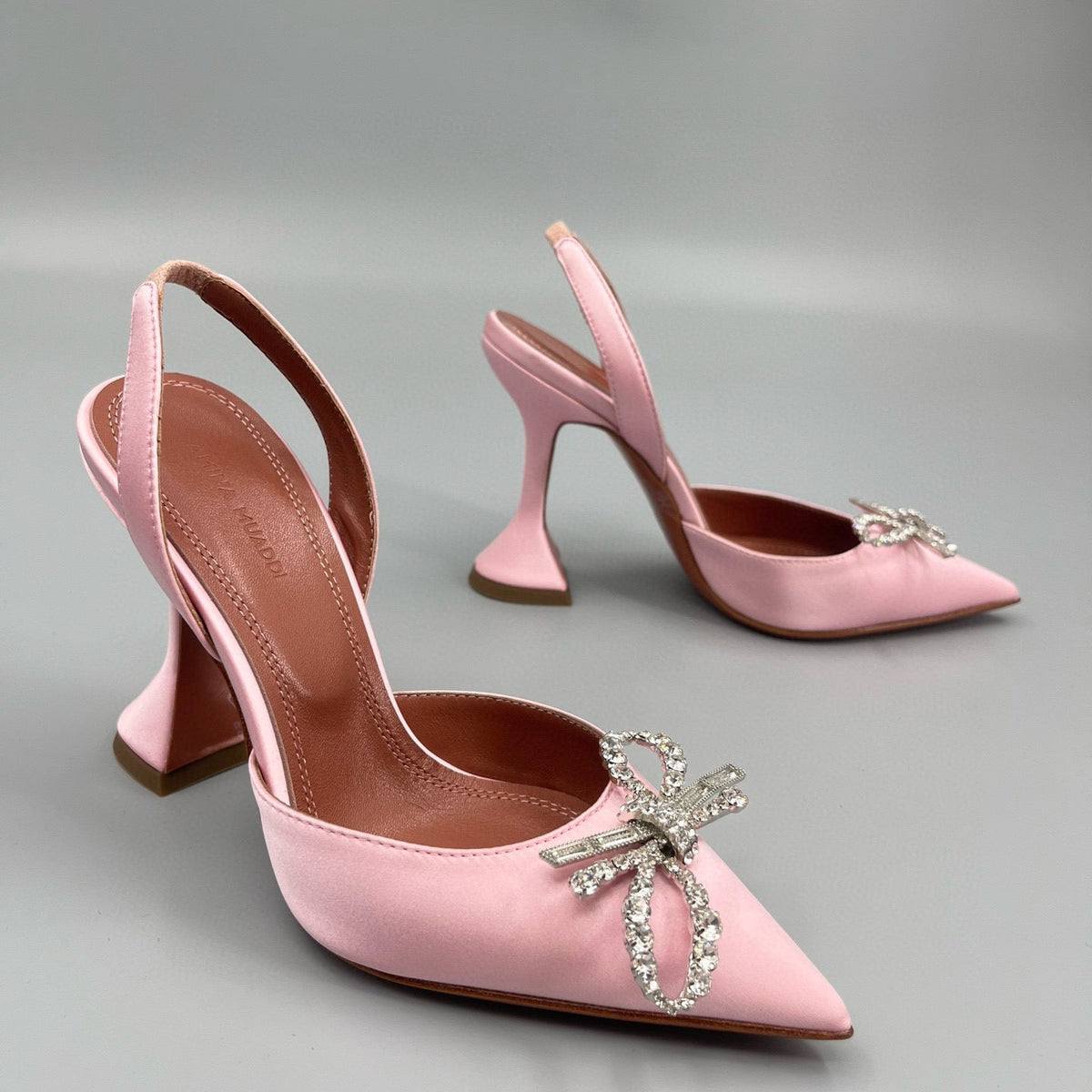 AMINA M HEELS