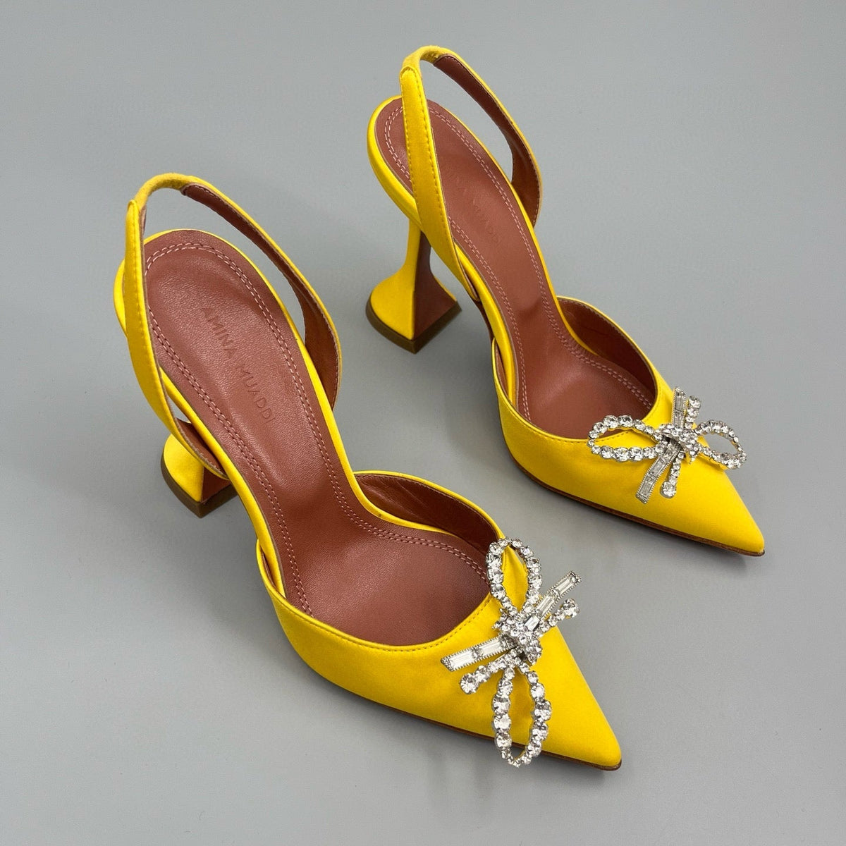 AMINA M HEELS