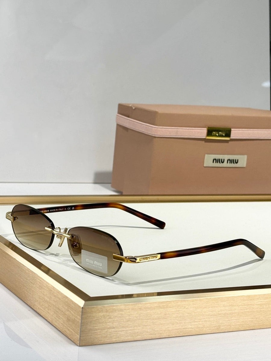 MIU M SUNGLASSES