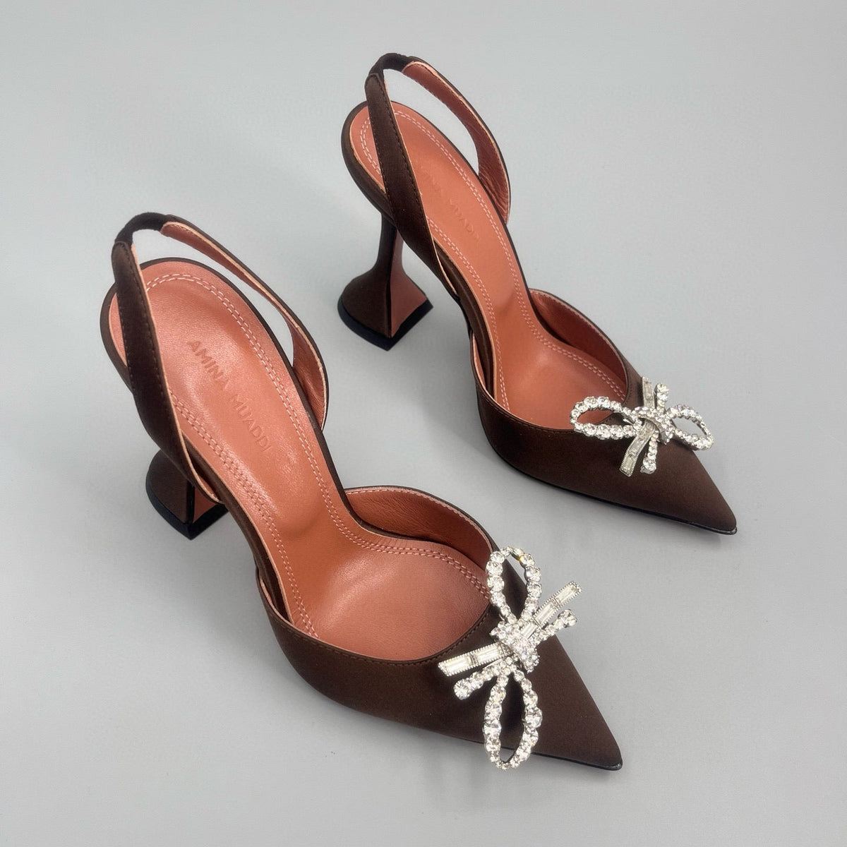 AMINA M HEELS