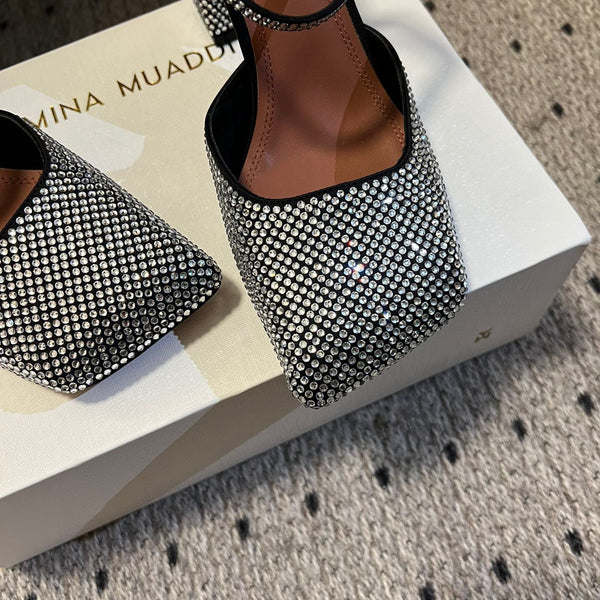 AMINA M HEELS