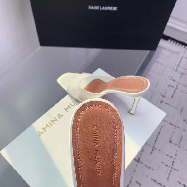 AMINA M HEELS
