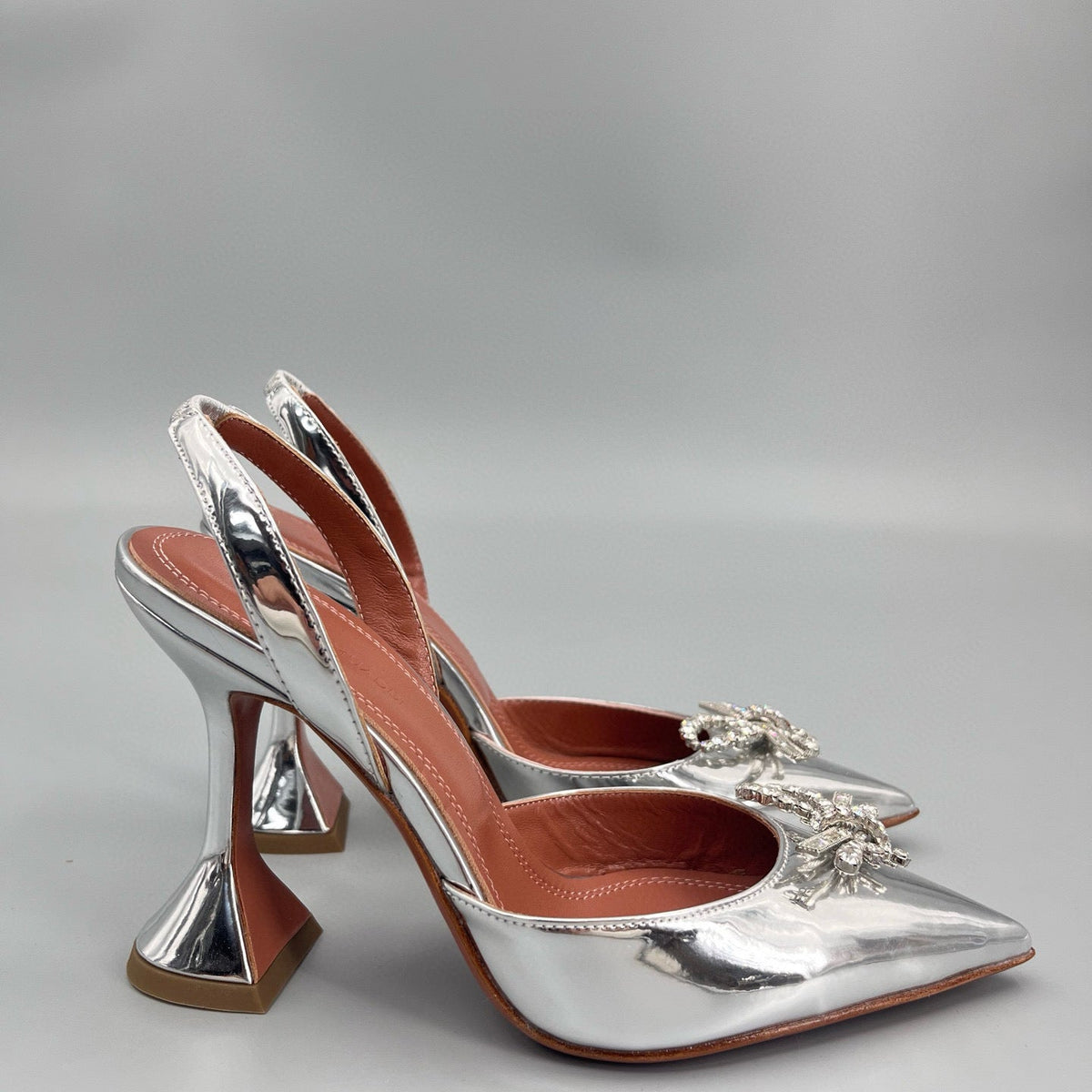 AMINA M HEELS