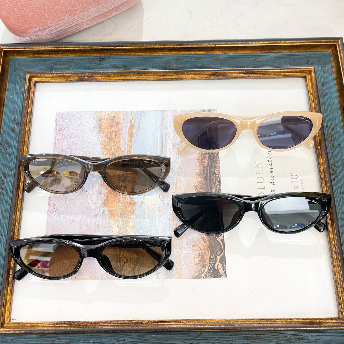 MIU M SUNGLASSES