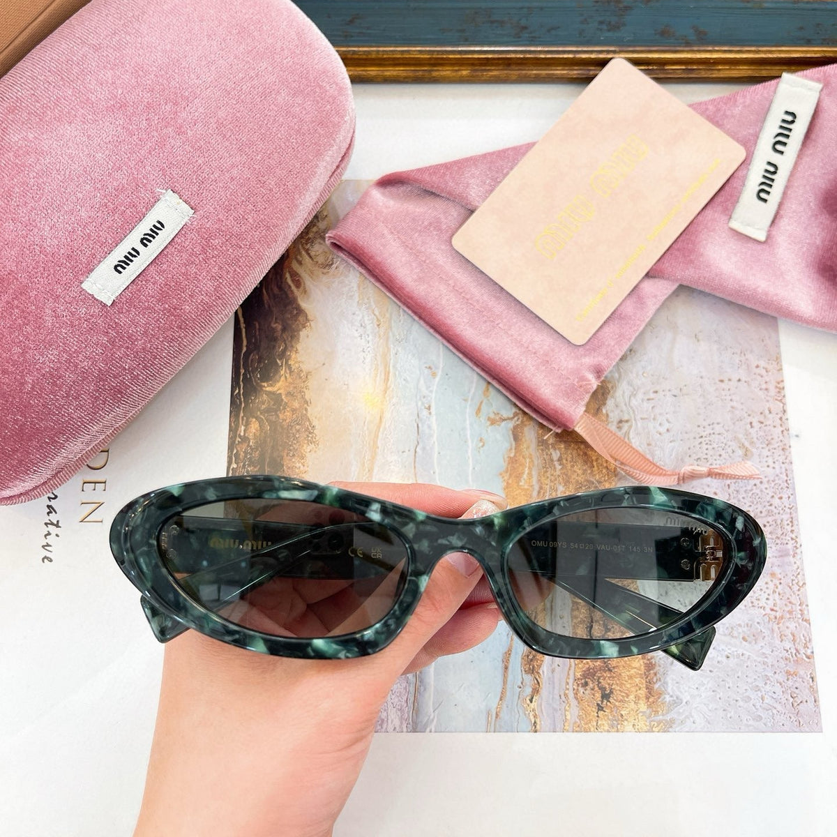 MIU M SUNGLASSES