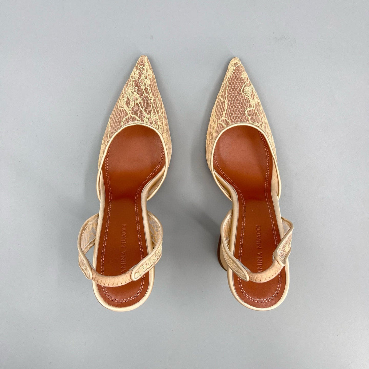 AMINA M HEELS