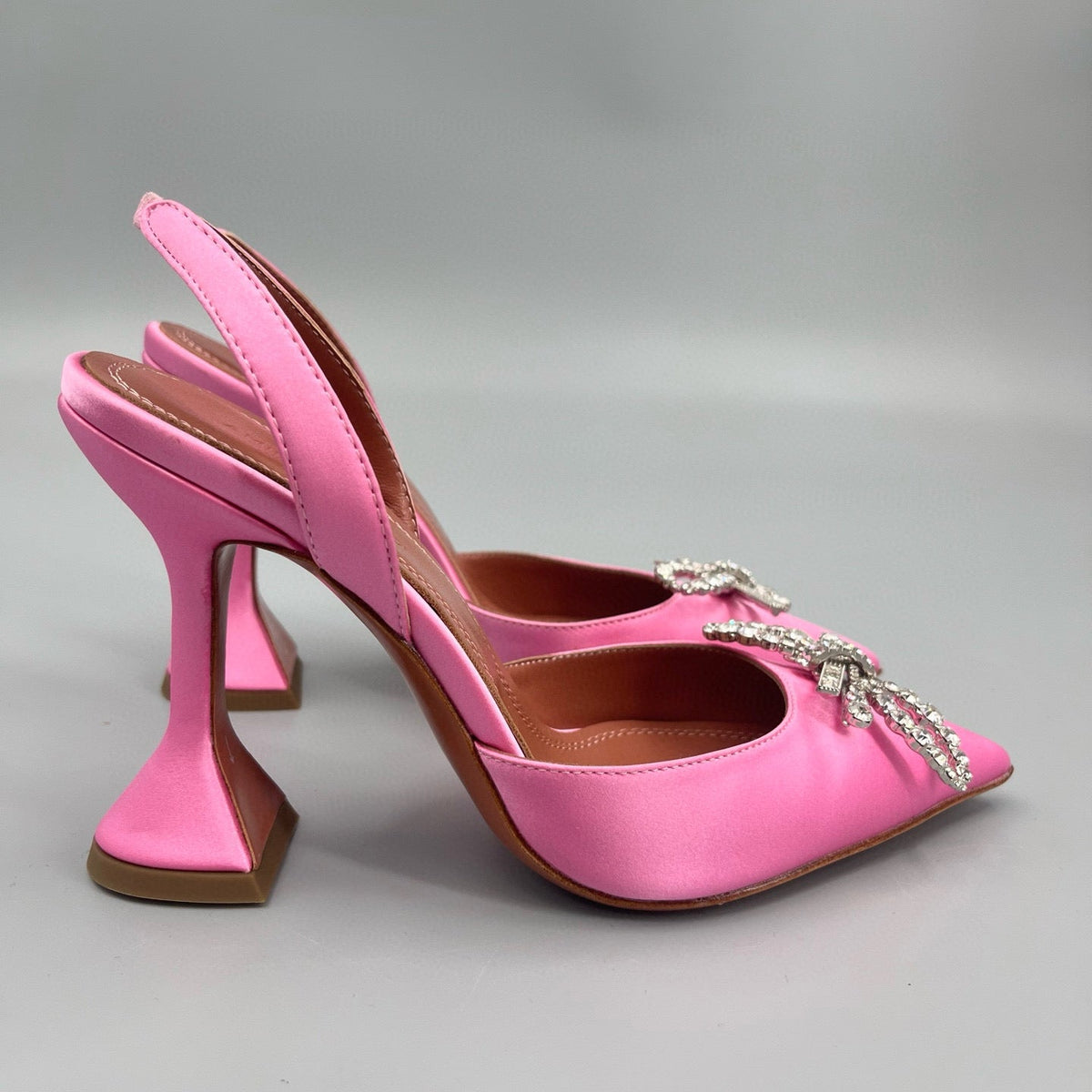 AMINA M HEELS