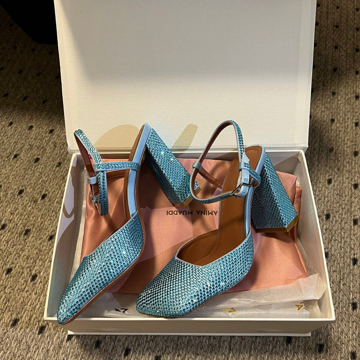 AMINA M HEELS
